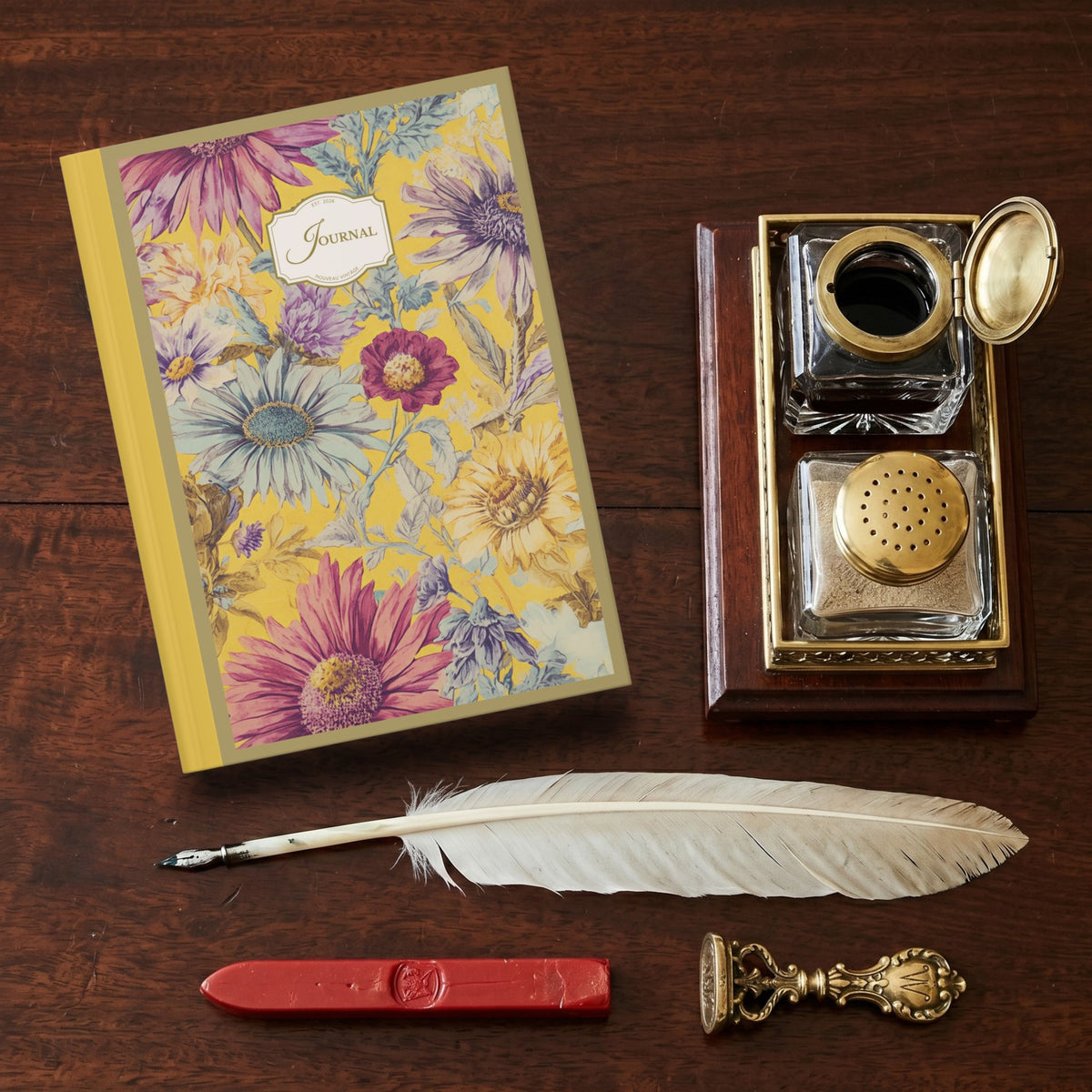 Decorative journal with inkwell set, feather pen, and sealing wax on a vintage wooden desk.