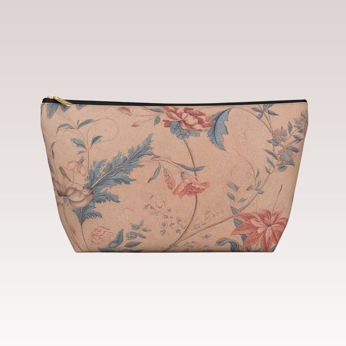 Decorative toiletry bag with a black zipper and a gold-tone zipper pull.